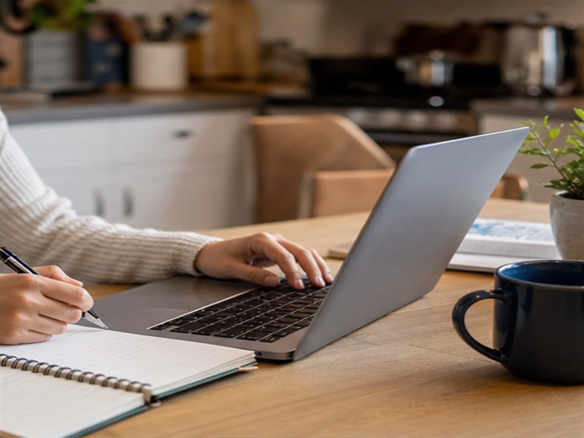 Renter reviewing housing notes on a laptop